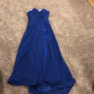 Long strapless dress with a front slit